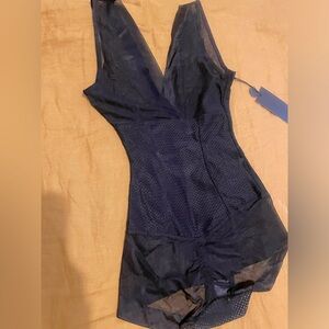Brand new!! Never warn, sexy teddy.  Shape-wear nylon waist, mesh bust and bum.